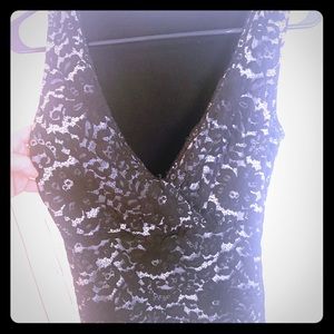 Boutique sleeveless lace going out top